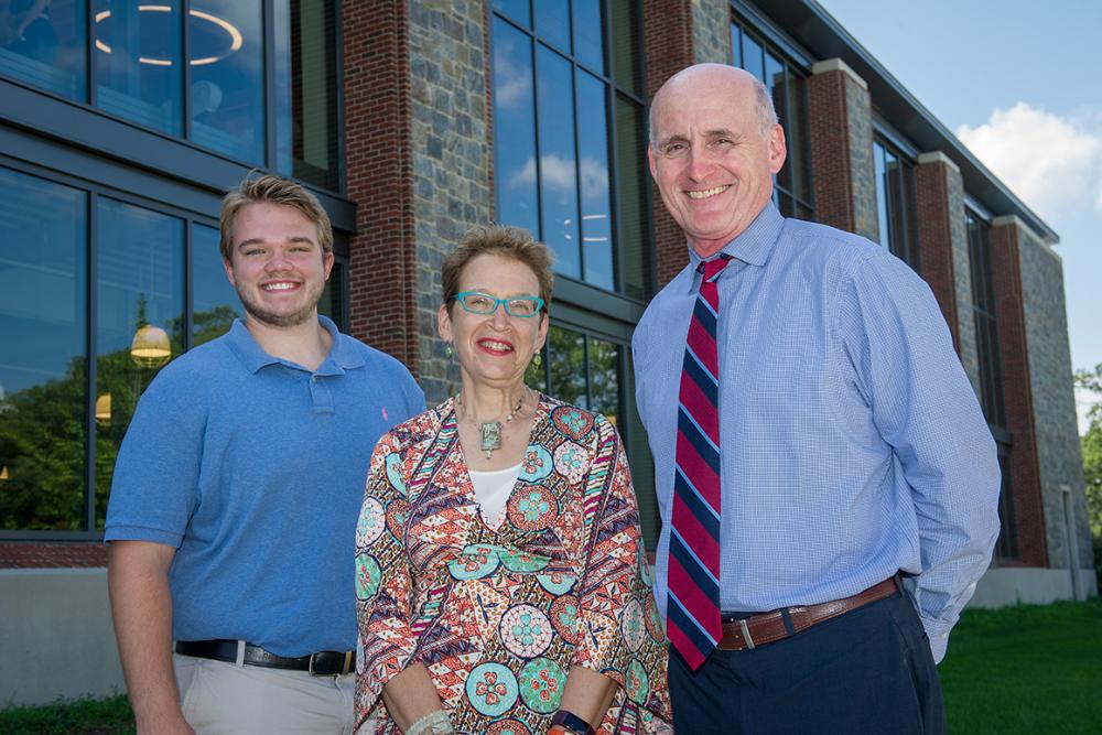Phyllis Bassin, Connor Kurpat ’22, and the Director of Athletics Tim Murray