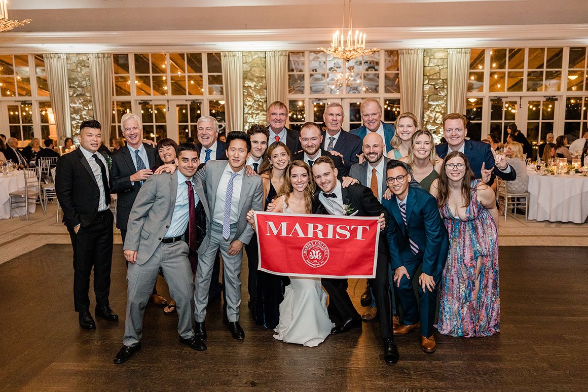 An image of the many Marist alumni who attended the wedding of Chris, Marist Class of 2014, and Rebecca McMahon including Angthony Tung ’14, Katie McCarthy ’14, Vincent Raia ’14, Katie (McAuliffe) Raia ’14, George Murphy ’14, Marielle (Cambell) Murphy ’14, Wallance Miranda ’14, Shannon Duncan ’14, Mark Nepf ’14, Scott Williams ’14, Nima Moshtaugh ’14, David Wang ’14, John Reilly ’76, Billy Turner ’76, Jimmy Dirscherl ’76, Anne Marie Dirscherl ’76, Peter Stuebe ’77, and Dave Richardson ’78.