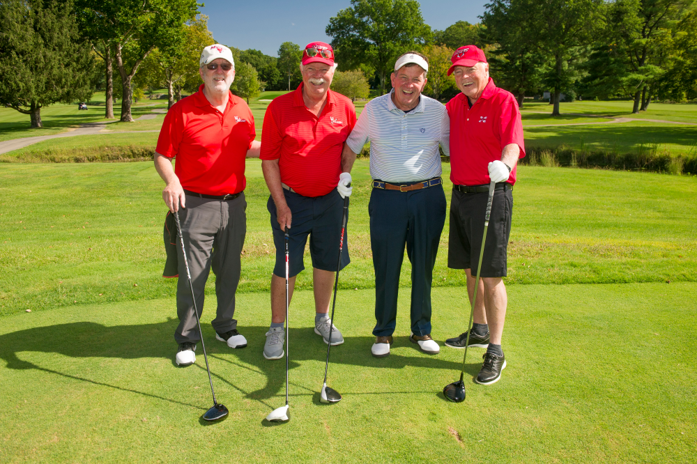 Tim Brier ’69. Pictured with Tim, far right, are classmates Dan Mahoney, Bill Rowley, and Tim Keneally.