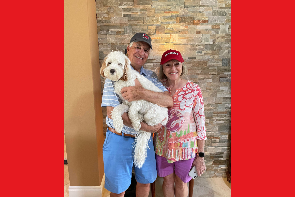 An image of alumnus George Majestic, Marist Class of 1971, and his wife, Carol, with their dog, Piper.