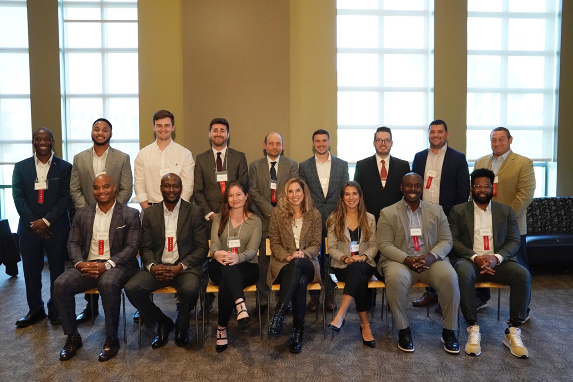 An image of alumni who returned Marist in fall 2022 to meet one on one with students at the VIP Networking Event presented by the Center for Career Services. The graduates gave students tips on finding internships and full-time jobs and succeeding in their career fields. Participants were, left to right, seated, first row: Shawn Lawson ’02; Clarence Faison ’02; Ciara Mulligan ’18; Alex Soviero ’09; Julia Gerogiannis ’18; Loyan Mensah ’03; Eric Bost ’03. Standing, second row: Daemyian Watson ’06, MSIS ’12; Tareek Turner ’15; Max Heinrich ’22; Christopher Glogan ’19, MA ’20; Brian DiFilippo ’03; Connor Liverio; David Campbell-Clark ’08; Charles Engle ’07; Richard Nass ’92.